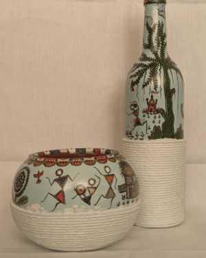 Warli painting on a. set of Glass bottle and terracotta pot - Leena Phuria